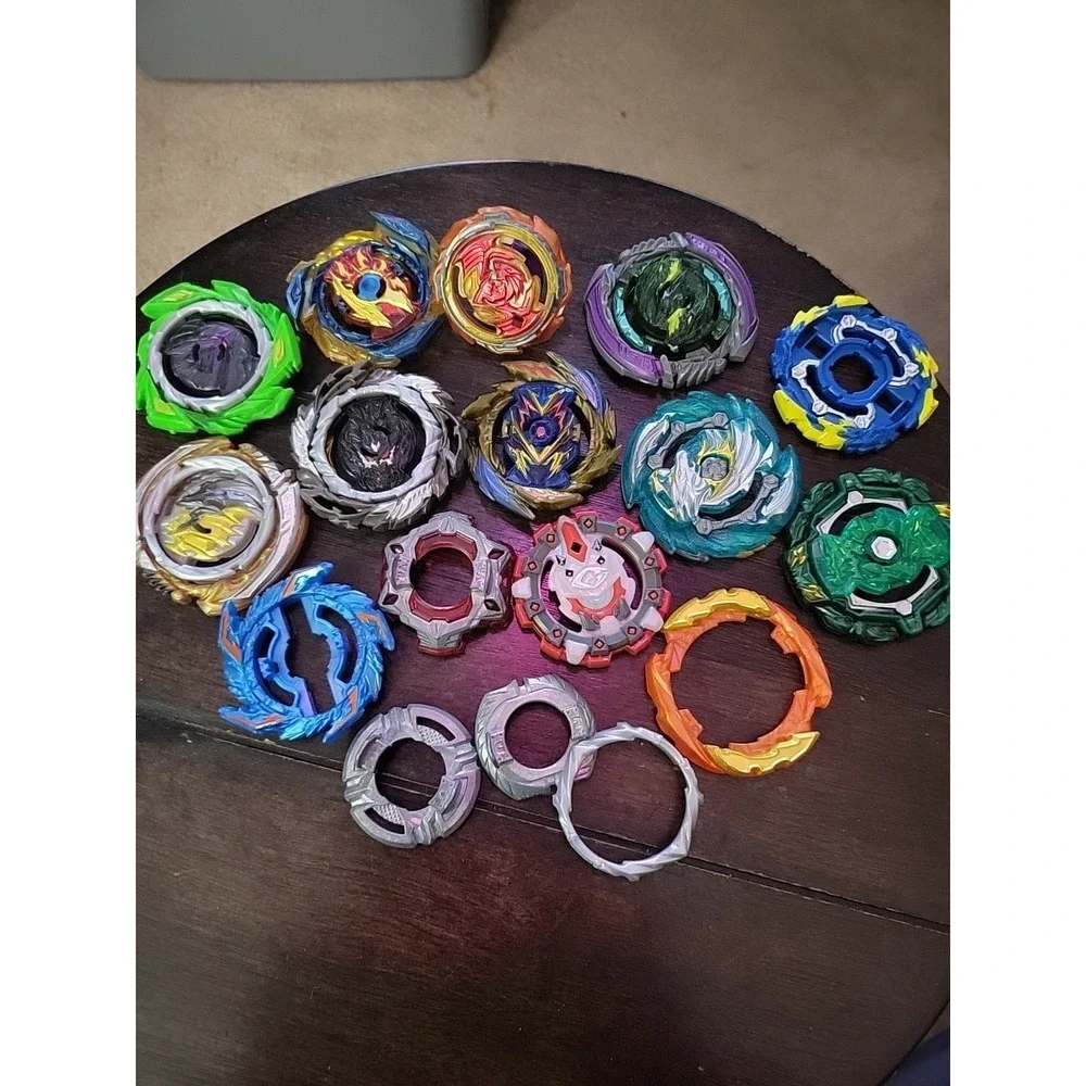 Lot of mixed Beyblade misc parts, bey top pieces and other as‎ seen
